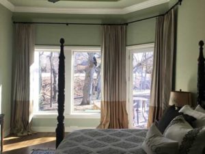 Windows of a bedroom with curtains
