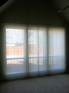 Window with vertical blinders
