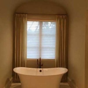 Silhouette Shading by Hunter Douglas in the Alustra Brio fabric in the bathroom window