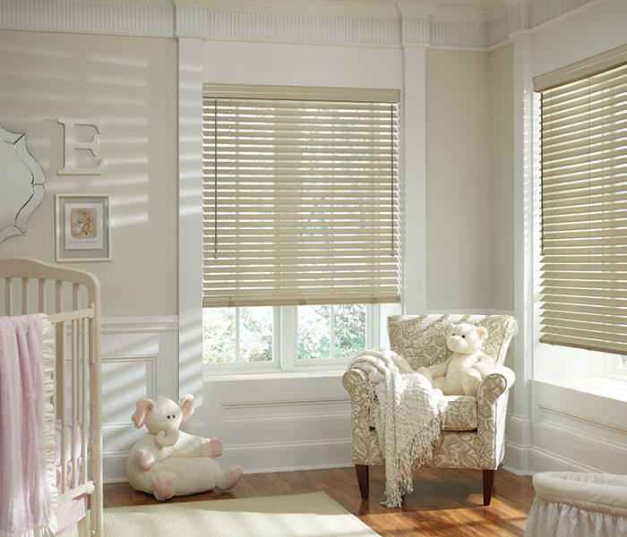 white shutter windows in baby room